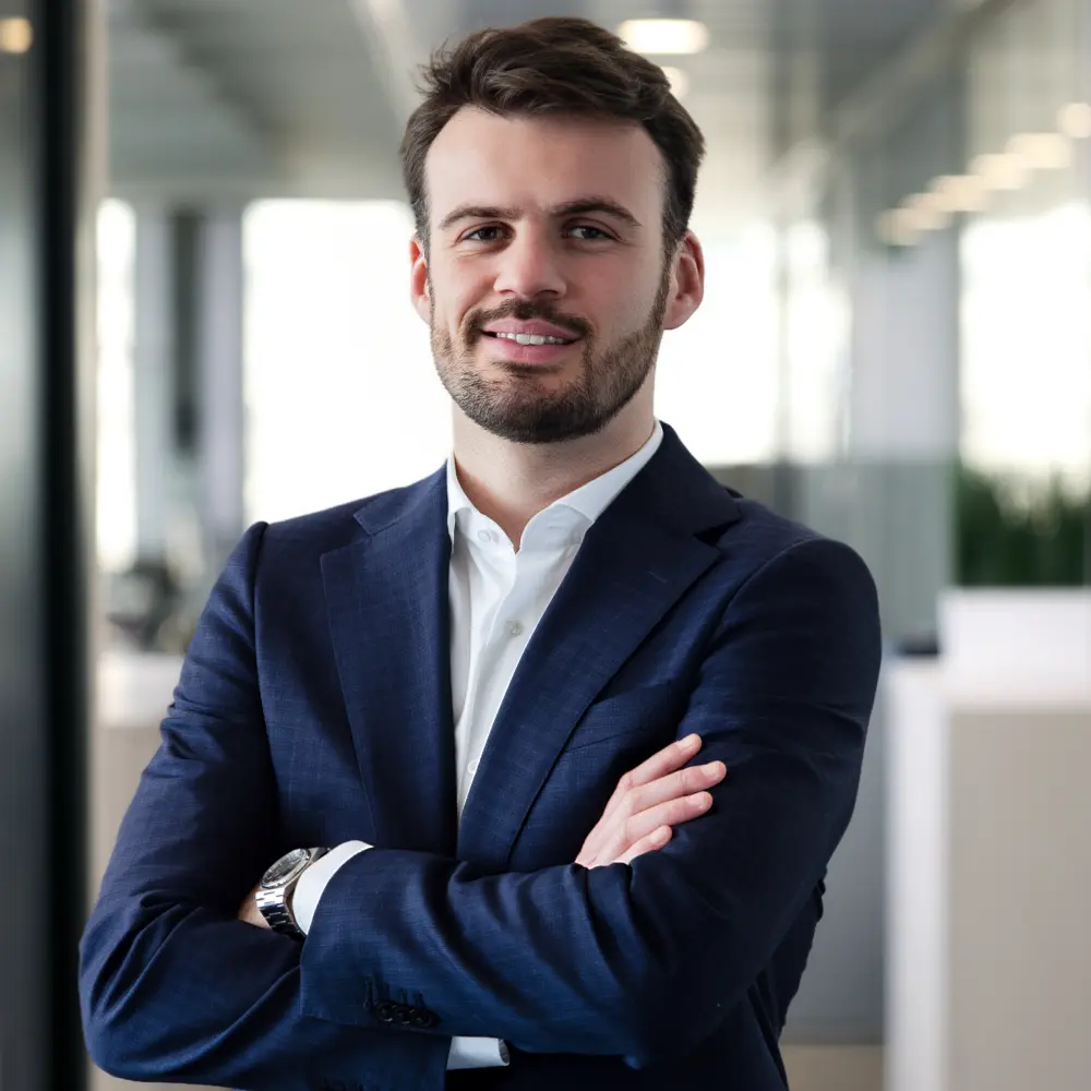 Portrait of Jules Desportes, Financial advisor, taken in our Lausanne office.